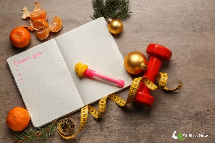 A journal open with fitness goals and affirmations written down.